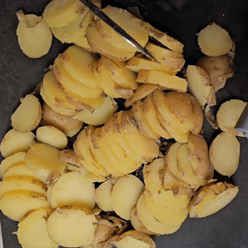 sliced-potatoes-corned-beef-hash-recipe